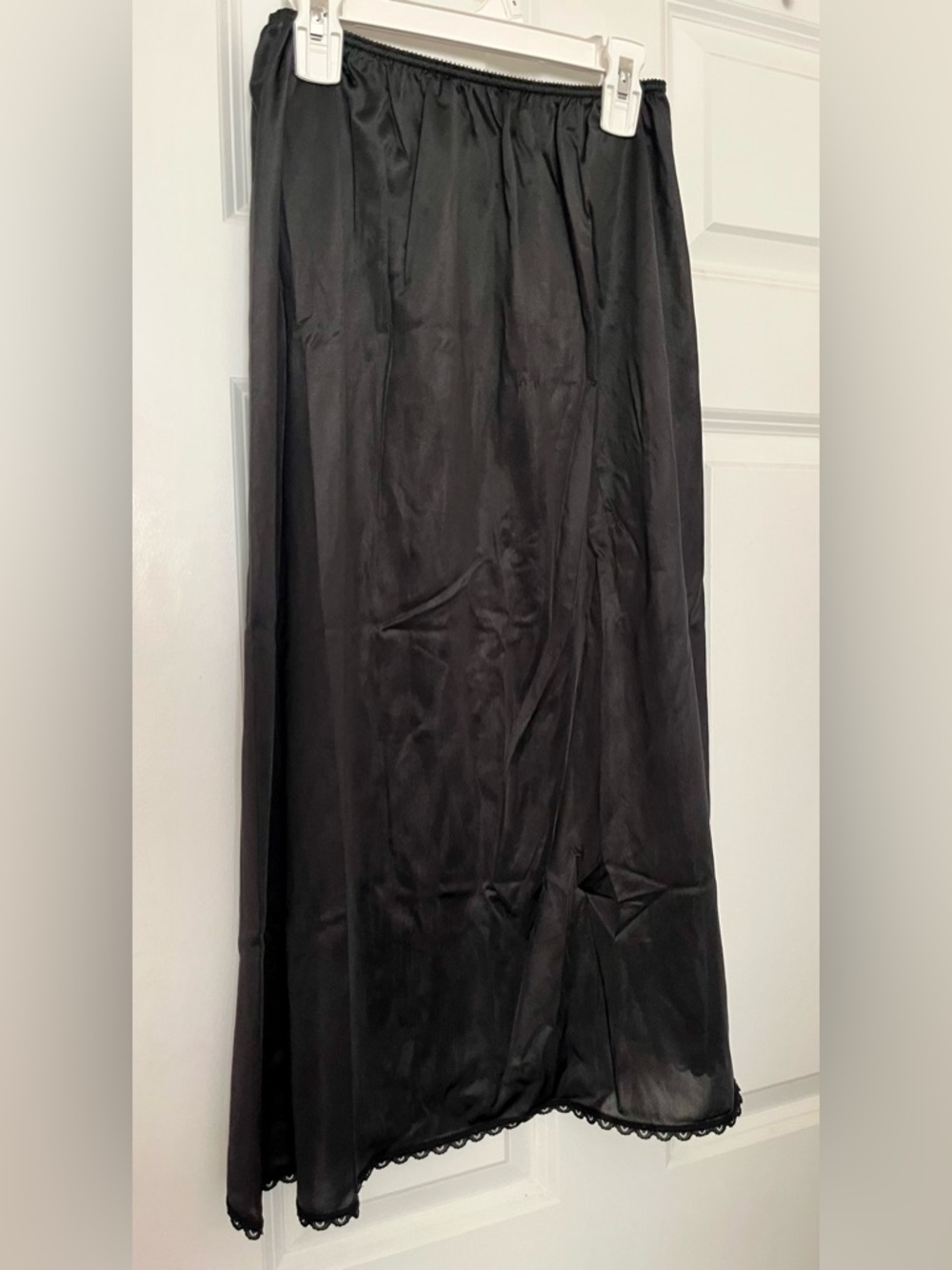 Vintage Warner Black Satin Slip Skirt with lace trim, high lo back good elastic